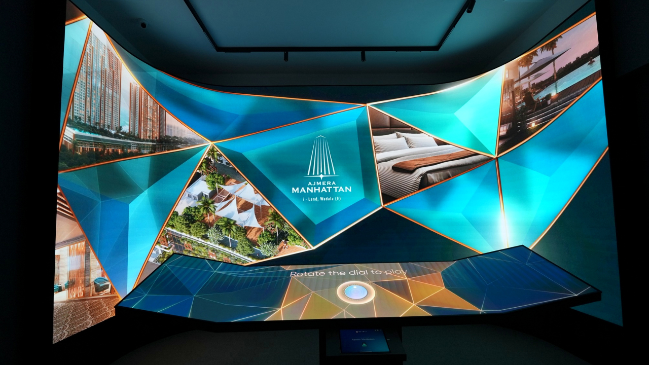 Ajmera Manhattan immersive room with curved LED and butterfly display